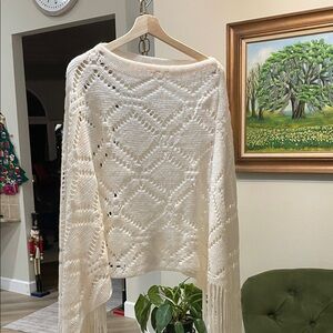 Elegant Cream Knit Pancho with Fringe